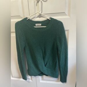 Womens sweater runs small